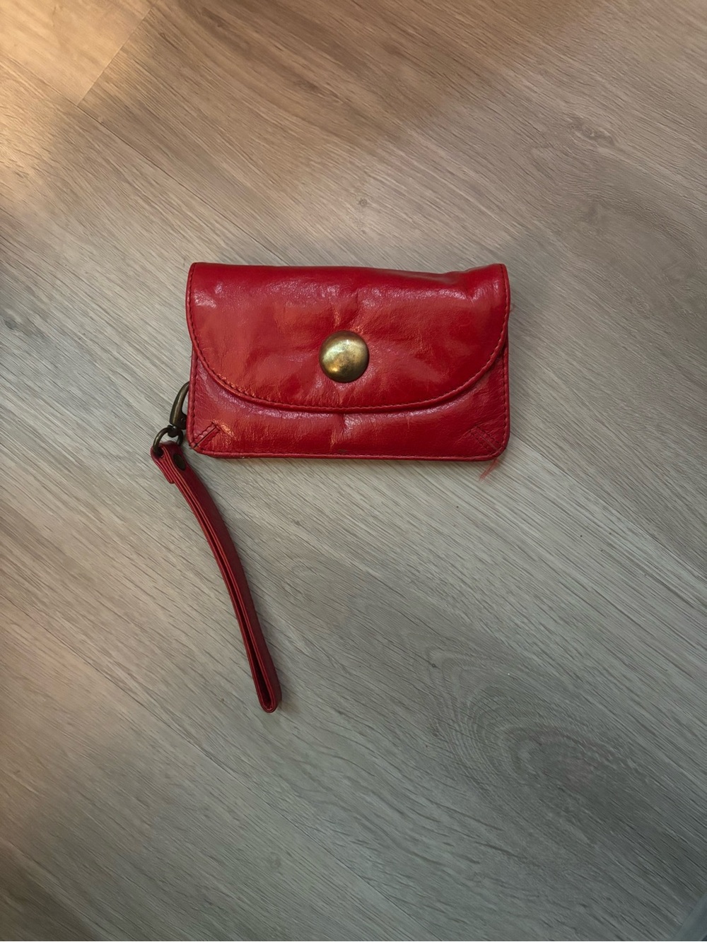 latico red leather wristlet with brass snap